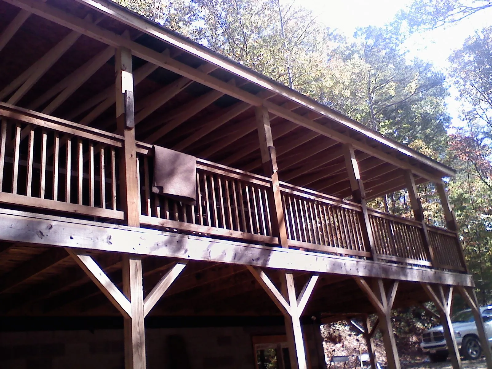 Timber framing under a new elevated porch and deck — Roof Leak Repair in Ellington by Roofing Brothers